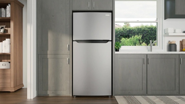 Frigidaire top freezer refrigerator in a kitchen