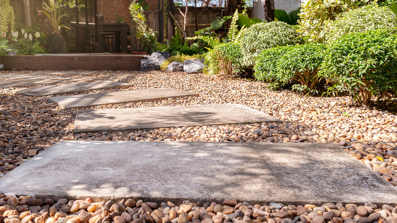 Pea gravel in a flower bed