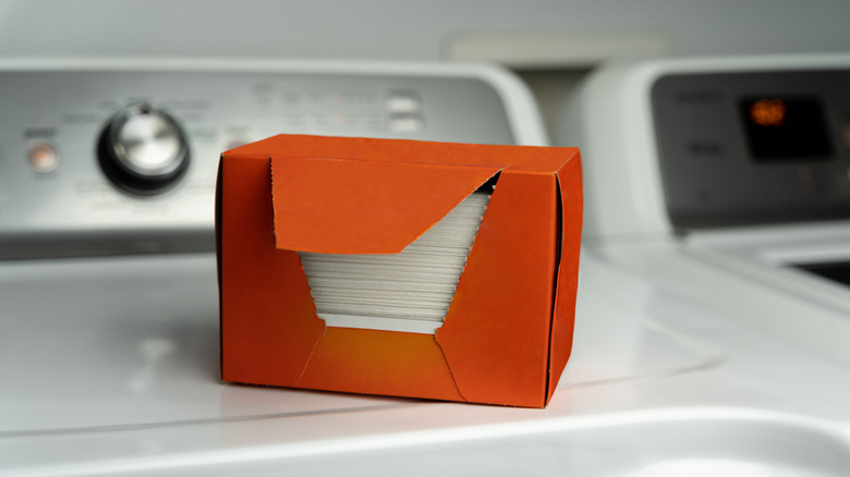 packet of dryer sheets on a tumble dryer
