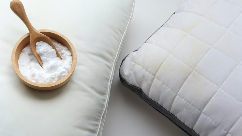 stained pillows with cleaning powder