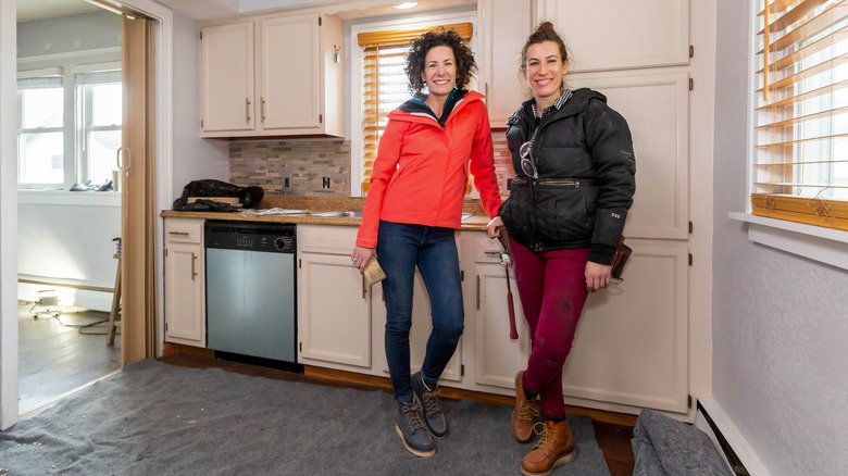 Lindsey Uselding and Kirsten Meehan standing in kitchen