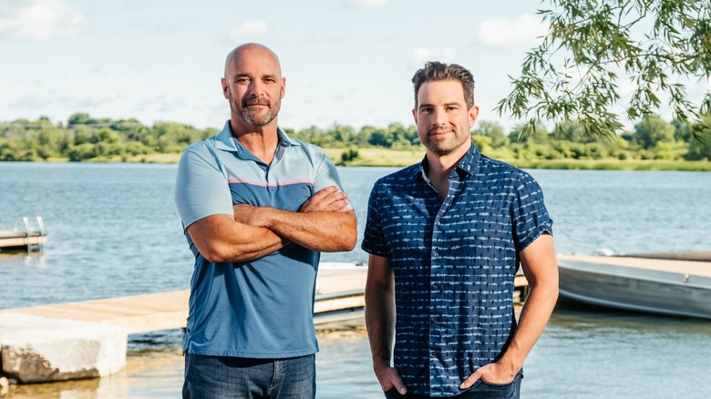 Bryan Beaumler and Scott McGillvary standing by a lake