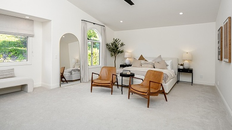 room with wall-to-wall gray carpeting