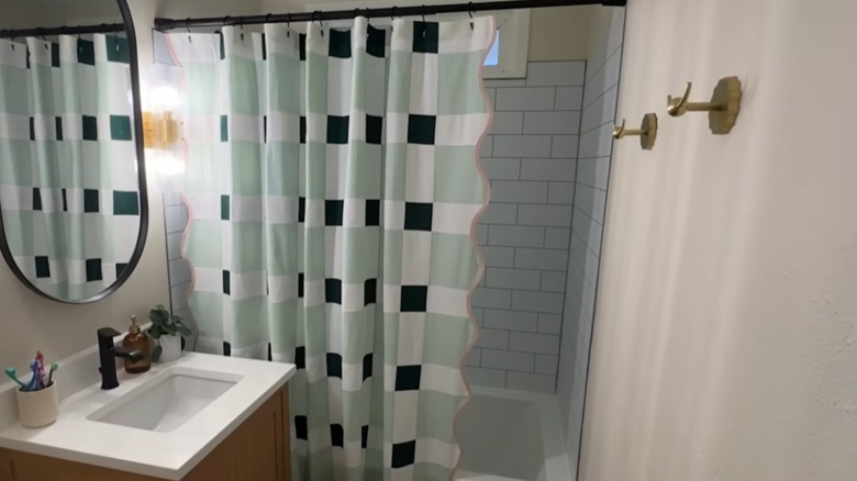 finished DIY patchwork shower curtain in a bathroom