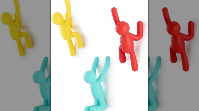 Multicolor Umbra Buddy Wall Hooks on display.