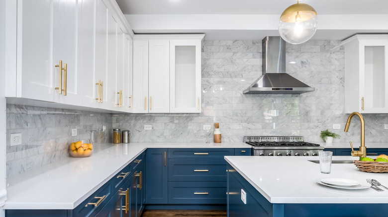Blue and white kitchen cabinets