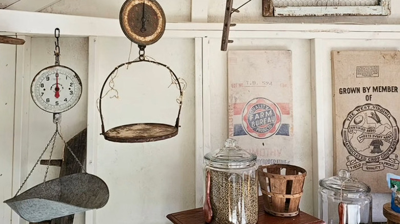 Antique scales hanging in a vintage inspired kitchen