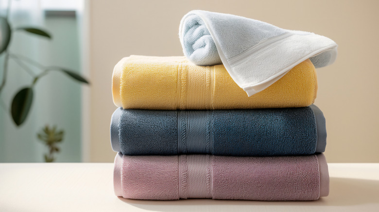 A stack of towels in the bathroom