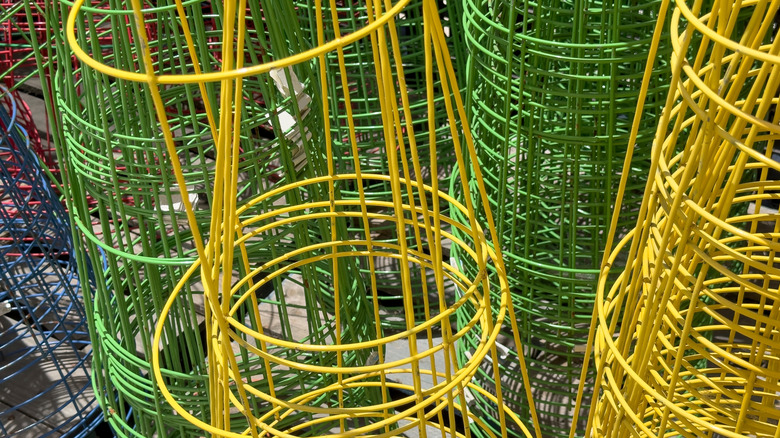 A view of stacks of tomato cages, on display at a local retail store