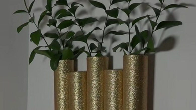 DIY wall vase made from Pringles cans