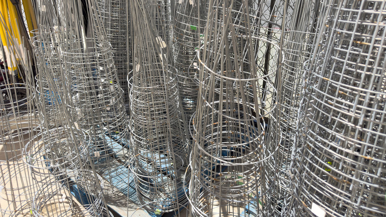 stacked tomato cages being stored