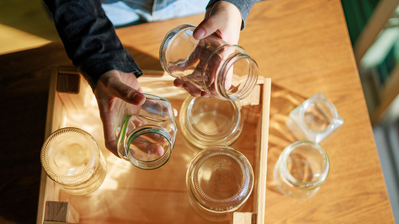 An empty glass jar on a counter
