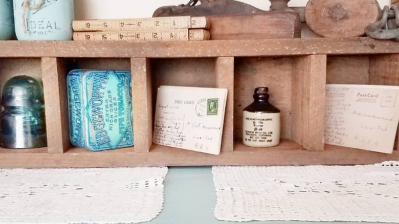 Wooden shelf on console table