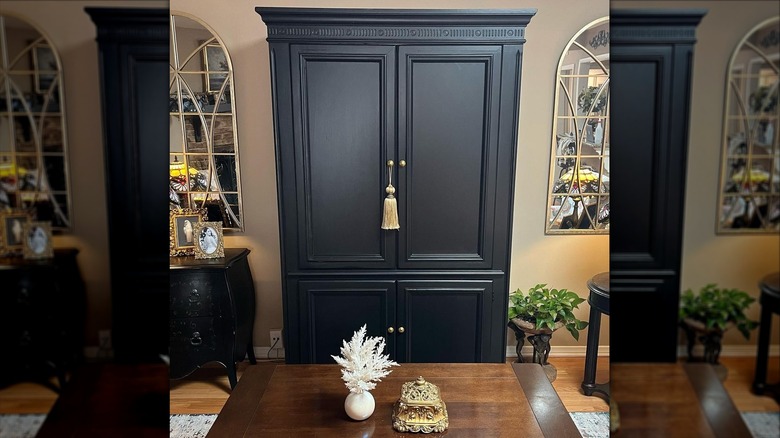 black painted tv armoire