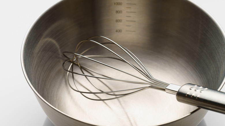 Stainless steel bowl with a whisk
