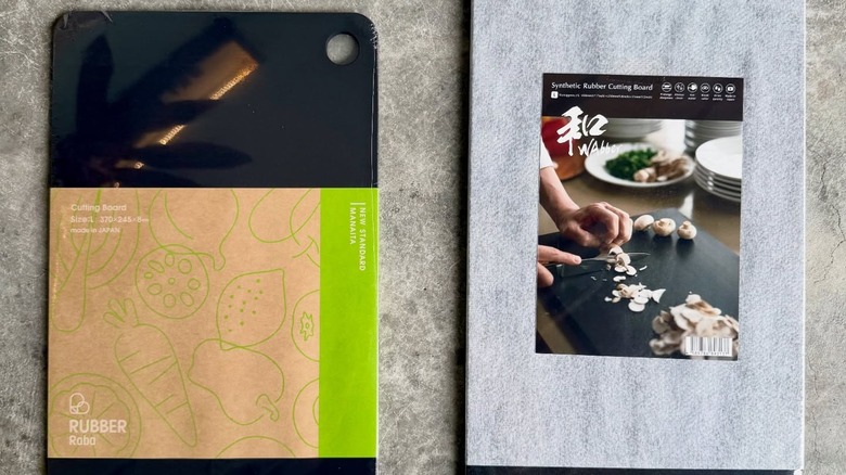 Two rubber cutting boards next to each other on a countertop