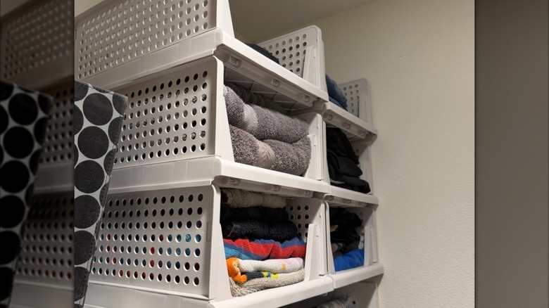 towel organizer on a shelf