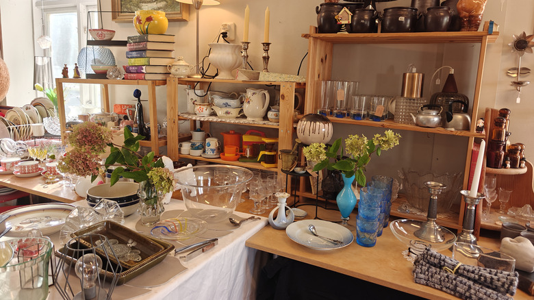 Thrift store display showing various household items