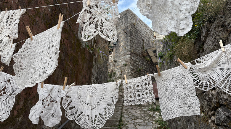 Doilies hanging outside on a clothesline