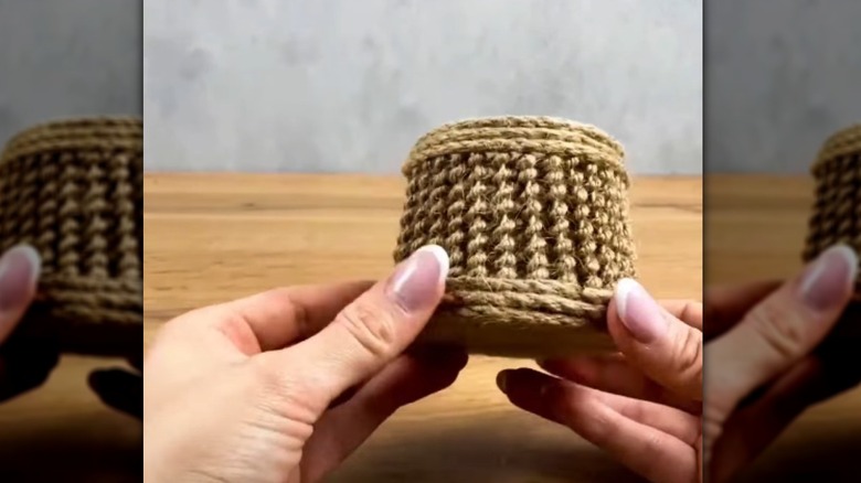 DIY mini planter made using jar lid, toothpicks, and twine