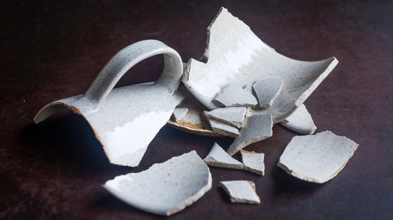 A broken mug on a table