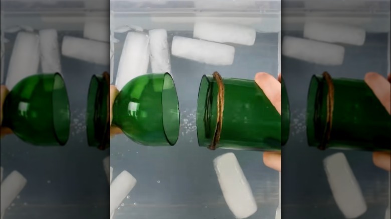 This video shows how to cut glass bottles with a string and water.