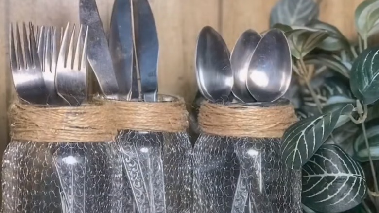 jars holding utensils