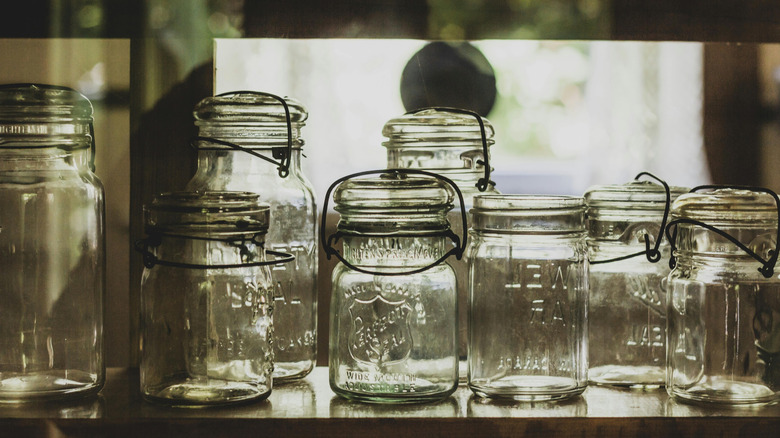 Empty Mason jars sitting on table