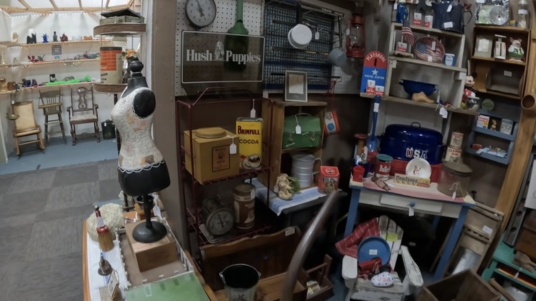 A thrift store with vintage memorabilia and furniture.