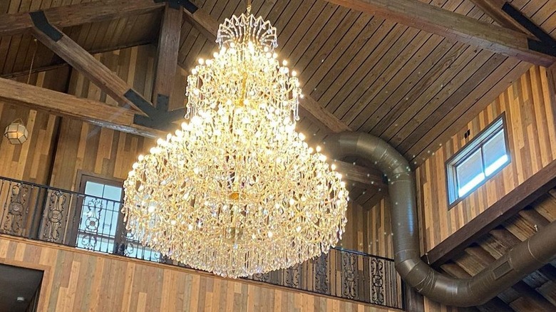 Crystal chandelier in wood A-frame 