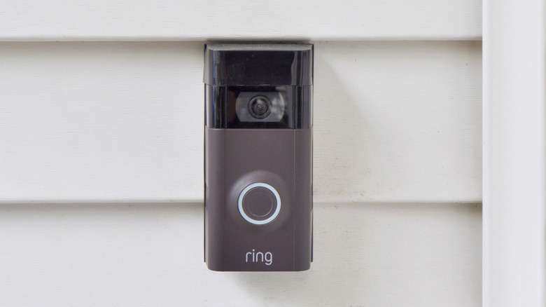 Ring doorbell security camera mounted outside a home