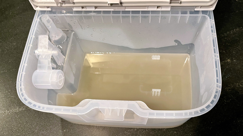 The dirty water tank of the Roborock Qrevo Edge 3 Pro robot vacuum and mop after a mopping cycle