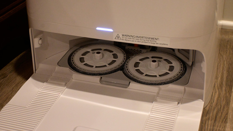 The mop heads resting in the dock of the Roborock Qrevo Edge 3 Pro robot vacuum