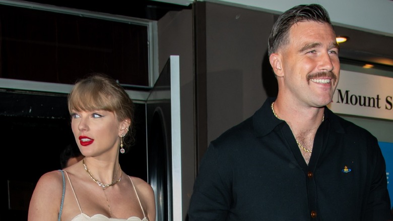 Taylor Swift and Travis Kelce together at event