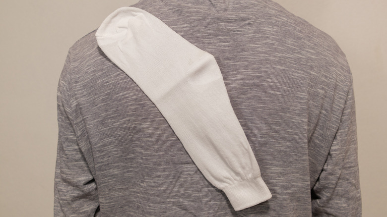 Sock sticking to shirt due to static