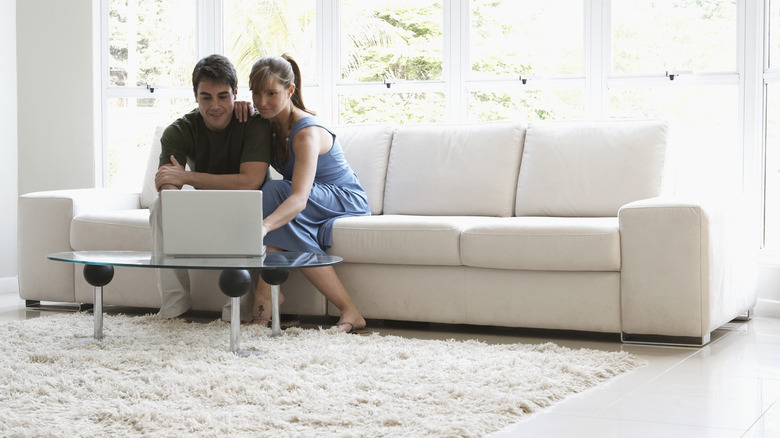 people sitting on a couch