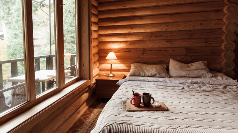 Log cabin bedroom and window