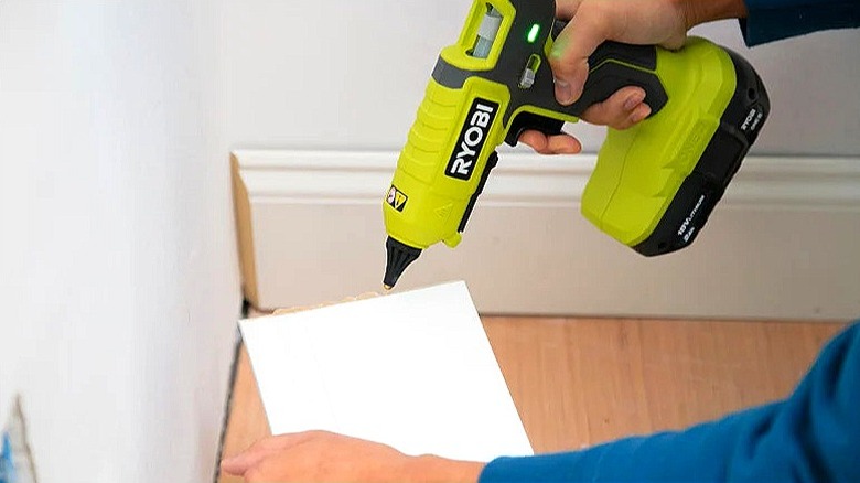 The Ryobi 18V One+ Dual Temperature Glue Gun is used on a DIY project