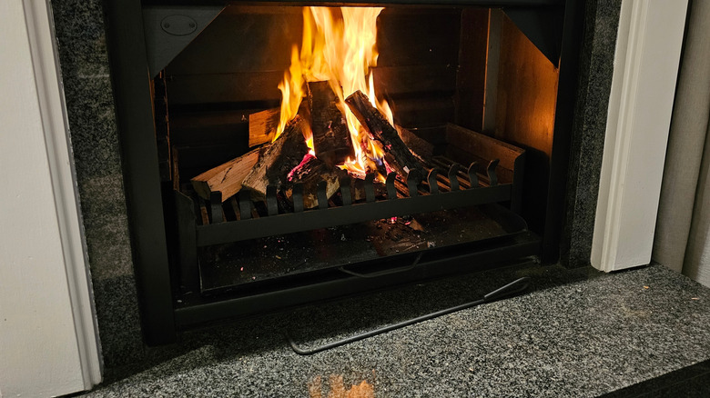 Gas fireplace with lit fire