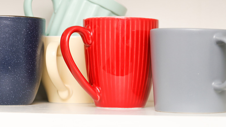 Coffee mugs on a shelf