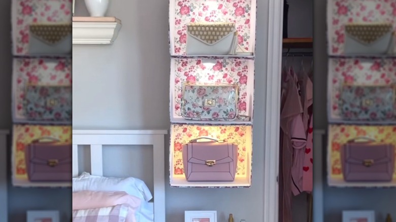 Handbag shelf made from decorated cardboard boxes