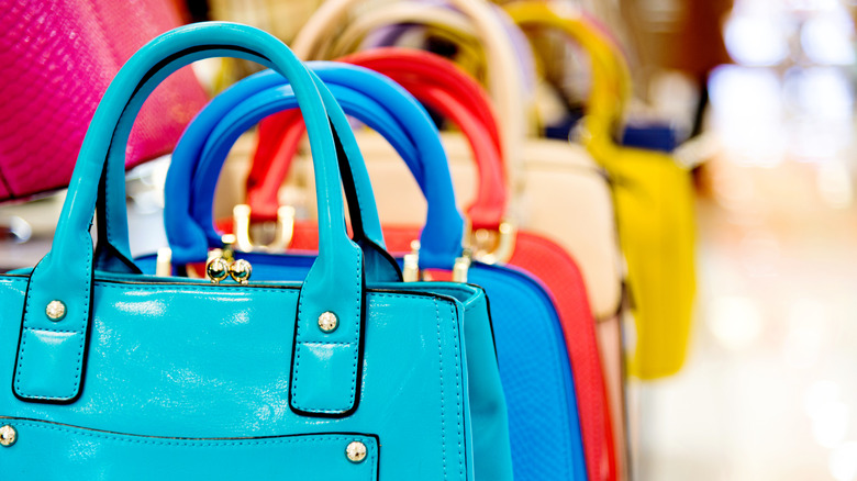 Purses displayed in an organized manner