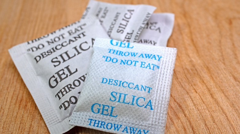 Three silica gel packets