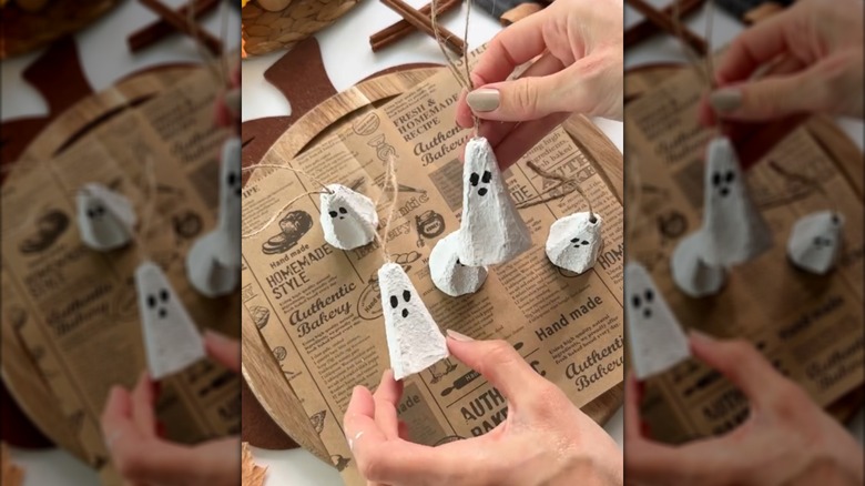 Mini ghosts crafted out of egg cartons