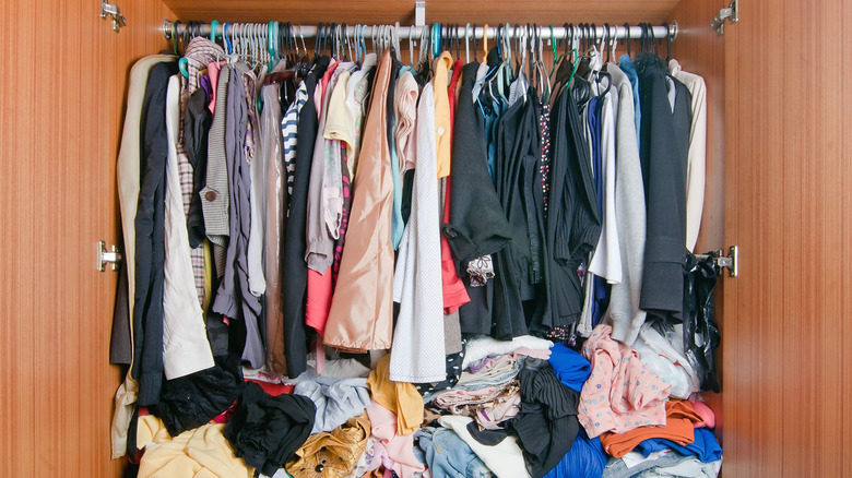 Lots of clothing in closet