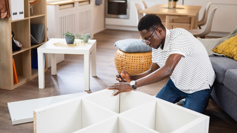 Person assembling IKEA furniture