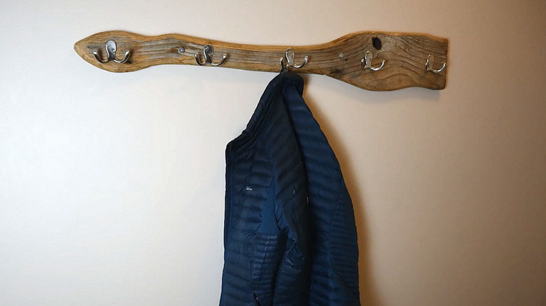 Finished look of homemade driftwood towel rack