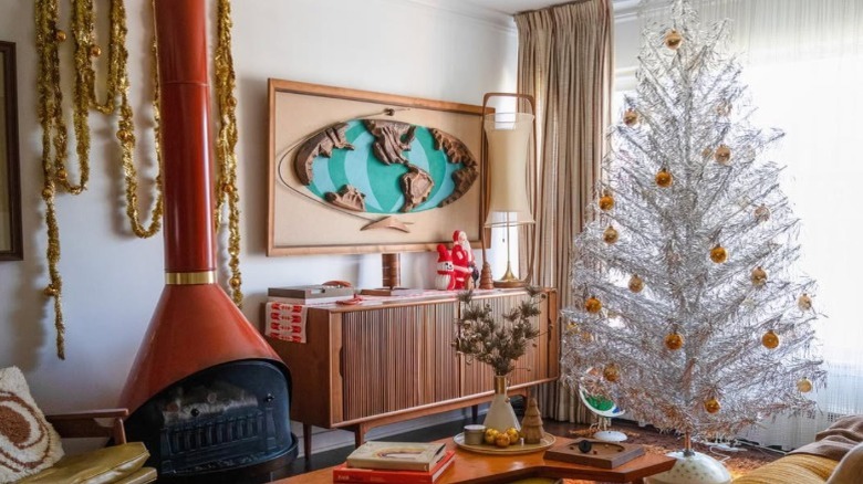 A mid-century style living room with a silver aluminum tree