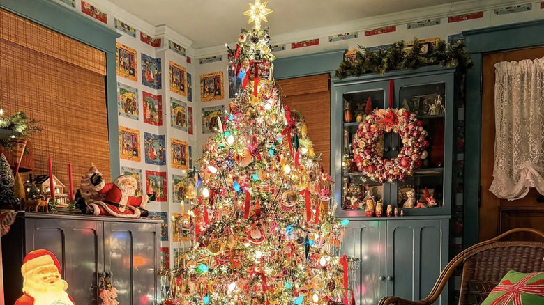 A vintage-inspired tree covered in metallic glass Christmas ornaments