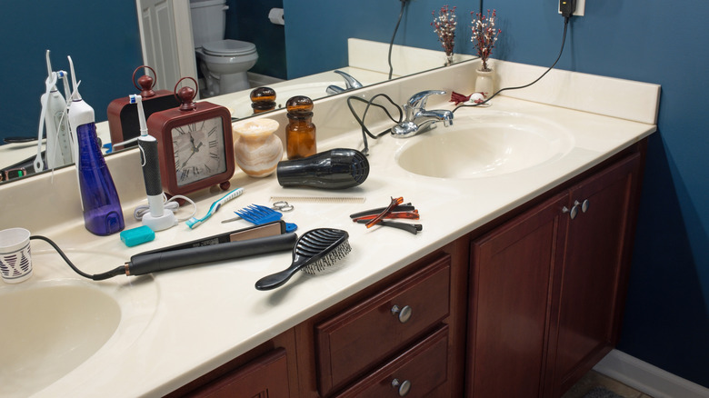 Cluttered bathroom countertop.